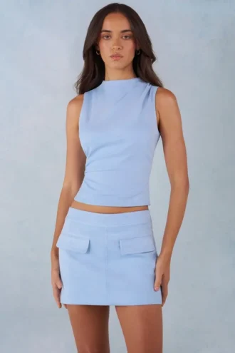 Top a collo alto in finta pelle scamosciata Aurelle  in blu tenue