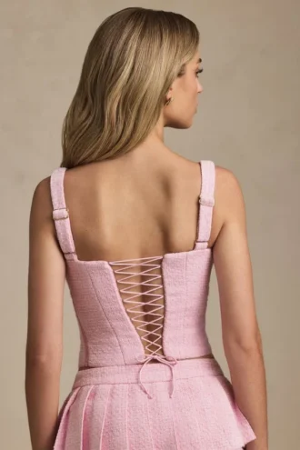 Top a corsetto allacciato Nami in rosa tenue