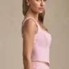 Top a corsetto allacciato Nami in rosa tenue Top a corsetto allacciato Nami in rosa tenue