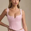 Top a corsetto allacciato Nami in rosa tenue Top a corsetto allacciato Nami in rosa tenue