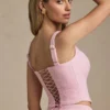 Top a corsetto allacciato Nami in rosa tenue Top a corsetto allacciato Nami in rosa tenue