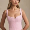 Top a corsetto allacciato Nami in rosa tenue Top a corsetto allacciato Nami in rosa tenue