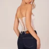 Top a corsetto con allacciatura a fascia Zoa in avorio