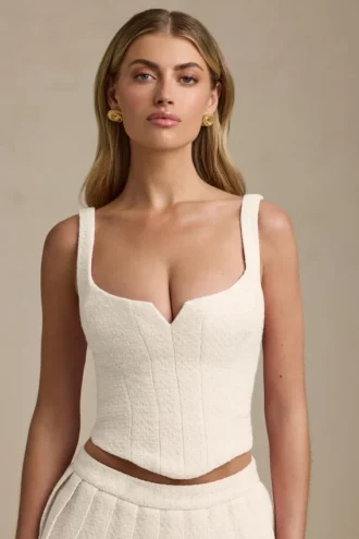 Top a corsetto con allacciatura Nami in avorio