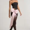 Top a corsetto con cut-out e fiocco Audrina in nero Top a corsetto con cut-out e fiocco Audrina in nero