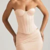 Top a corsetto con lacci Araminta in beige dorato Top a corsetto con lacci Araminta in beige dorato