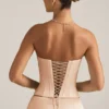 Top a corsetto con lacci Araminta in beige dorato Top a corsetto con lacci Araminta in beige dorato