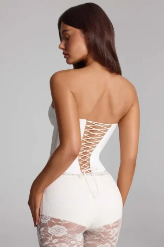 Top a corsetto con lacci Araminta in bianco