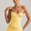 Top a corsetto con lacci Araminta in giallo pastello