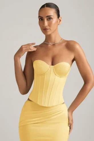 Top a corsetto con lacci Araminta in giallo pastello