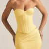 Top a corsetto con lacci Araminta in giallo pastello
