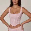 Top a corsetto con lacci decorati Letitia in rosa tenue Top a corsetto con lacci decorati Letitia in rosa tenue