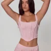 Top a corsetto con lacci decorati Letitia in rosa tenue Top a corsetto con lacci decorati Letitia in rosa tenue