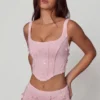 Top a corsetto con lacci decorati Letitia in rosa tenue Top a corsetto con lacci decorati Letitia in rosa tenue