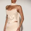 Top a corsetto con lacci e decorazioni Junelle con sciarpa in oro