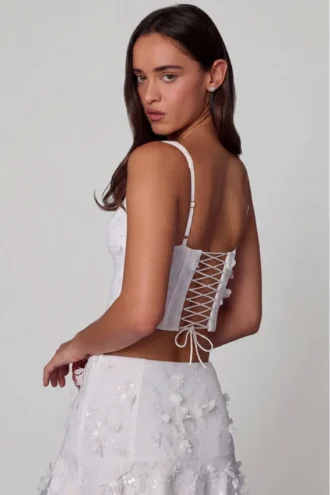 Top a corsetto con lacci e decorazioni Letitia in bianco