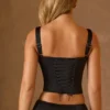 Top a corsetto con lacci Hannie in nero