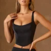 Top a corsetto con lacci Hannie in nero