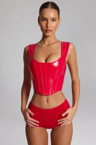 Top a corsetto con lacci in vinile Lamiya in rosso fuoco
