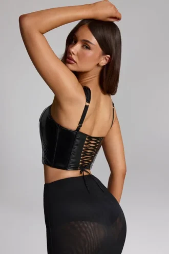 Top a corsetto con lacci in vinile Lamiya, nero