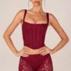 Top a corsetto con lacci Jemara in rosso ciliegia