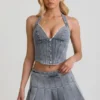 Top a corsetto con scollo all’americana Lotta in azzurro Top a corsetto con scollo all’americana Lotta in azzurro
