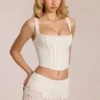 Top a corsetto con stecche e scollo rotondo in pizzo Cherith, colore avorio Top a corsetto con stecche e scollo rotondo in pizzo Cherith, colore avorio