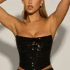 Top a corsetto drappeggiato con decorazioni in argento sterling, nero