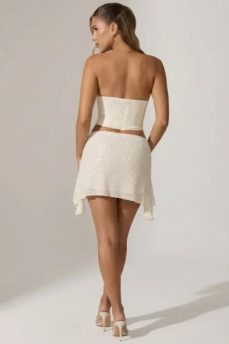 Top a corsetto drappeggiato con decorazioni Sterling in bianco
