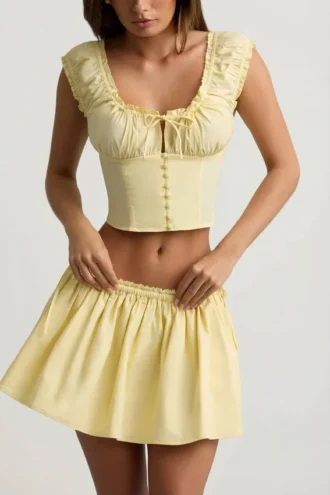 Top a corsetto in popeline di cotone arricciato Faela in giallo limone