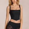 Top a corsetto regolabile con scollo morbido in pizzo Jemara, colore nero Top a corsetto regolabile con scollo morbido in pizzo Jemara, colore nero