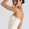Top a corsetto senza spalline con lacci e ruches Melvina in avorio Top a corsetto senza spalline con lacci e ruches Melvina in avorio