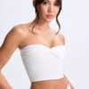 Top a fascia con davanti intrecciato Edie in Modal bianco Top a fascia con davanti intrecciato Edie in Modal bianco