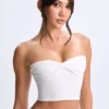 Top a fascia con davanti intrecciato Edie in Modal bianco Top a fascia con davanti intrecciato Edie in Modal bianco