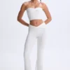 Top a fascia con davanti intrecciato Edie in Modal bianco Top a fascia con davanti intrecciato Edie in Modal bianco