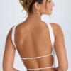 Top a fascia con dettaglio choker Khai in bianco