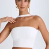 Top a fascia con dettaglio choker Khai in bianco
