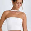 Top a fascia con dettaglio choker Khai in bianco