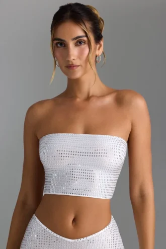Top a fascia con spalline incrociate sul retro e decorazioni Nanaka in bianco