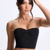 Top a fascia Edie in Modal con intreccio sul davanti, colore nero Top a fascia Edie in Modal con intreccio sul davanti, colore nero