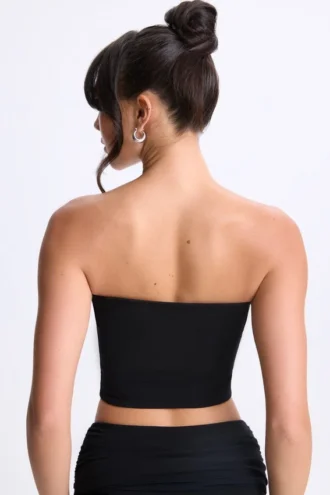 Top a fascia Edie in Modal con intreccio sul davanti, colore nero