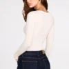 Top a maniche lunghe con arricciature in modal a coste Luisa, color avorio Top a maniche lunghe con arricciature in modal a coste Luisa, color avorio