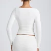 Top a maniche lunghe con arricciature in modal Emry, colore bianco Top a maniche lunghe con arricciature in modal Emry, colore bianco