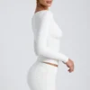 Top a maniche lunghe con arricciature in modal Emry, colore bianco Top a maniche lunghe con arricciature in modal Emry, colore bianco
