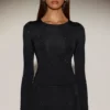 Top a maniche lunghe con collo rotondo e decorazioni Venia in nero Top a maniche lunghe con collo rotondo e decorazioni Venia in nero