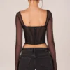 Top a maniche lunghe con corsetto Zella in nero Top a maniche lunghe con corsetto Zella in nero