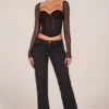 Top a maniche lunghe con corsetto Zella in nero Top a maniche lunghe con corsetto Zella in nero