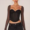Top a maniche lunghe con corsetto Zella in nero Top a maniche lunghe con corsetto Zella in nero