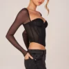Top a maniche lunghe con corsetto Zella in nero Top a maniche lunghe con corsetto Zella in nero