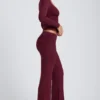 Top a maniche lunghe con ruches Emry in modal color prugna Top a maniche lunghe con ruches Emry in modal color prugna